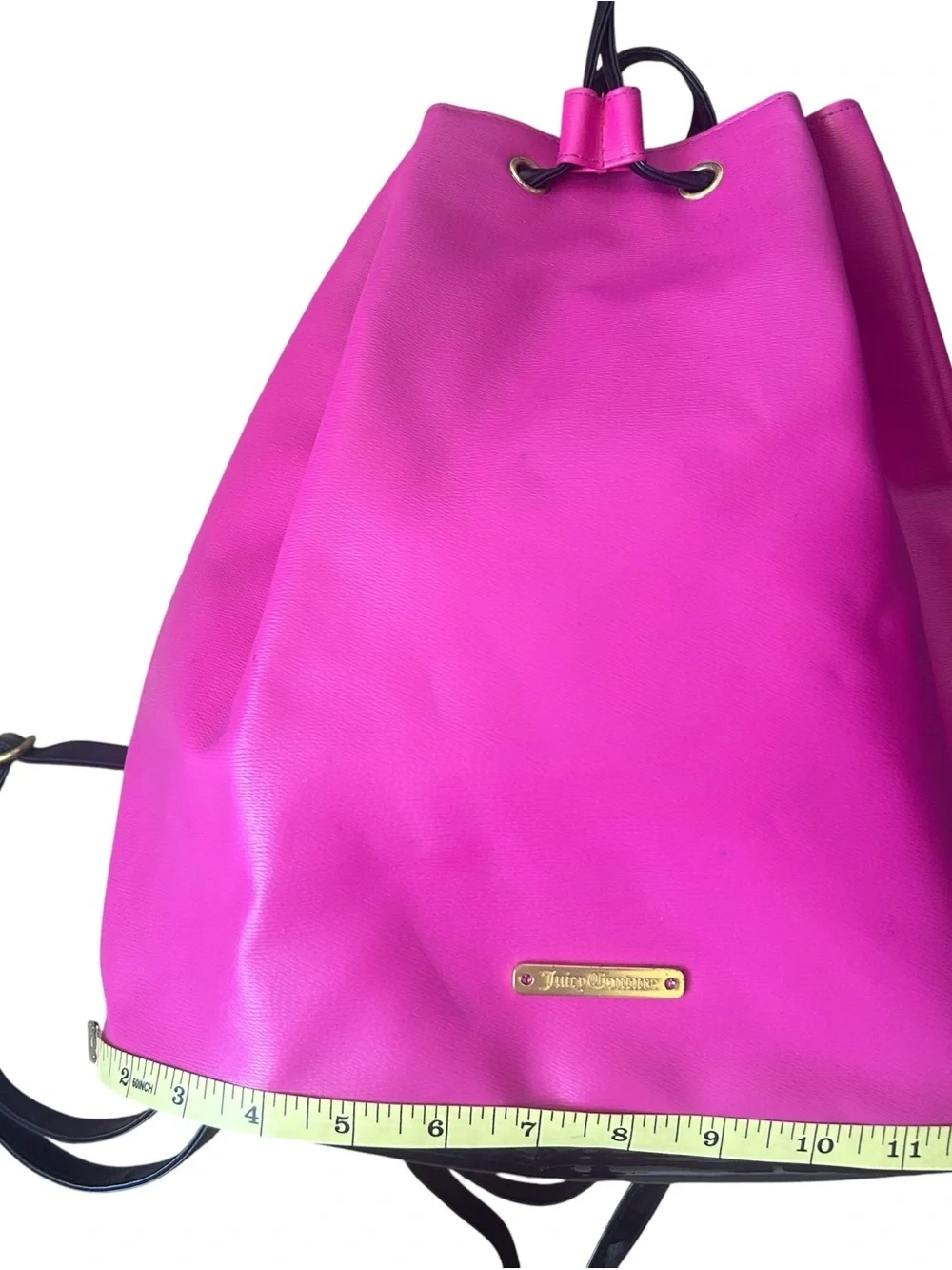 Juicy Couture Vibrant Pink Drawstring Backpack with Gold Accents